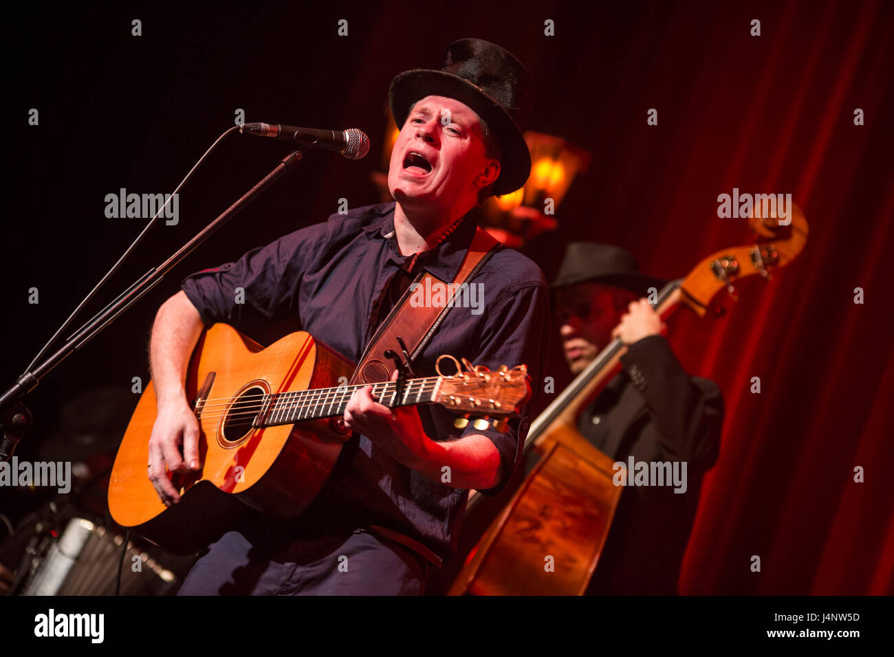 Marburg, Germany. 11.05.2017. Jimmy Kelly and Band, The Streetkid Vol. 2 Tour, concert in Waggonhalle Marburg. Jimmy Kelly - in the last years performing as busker/street performer - is know as member of folk and pop band The Kelly Family. In picture: Jimmy Kelly (left), Johannes Vos (rear, bass) --- Fotocredit: Christian Lademann Stock Photo