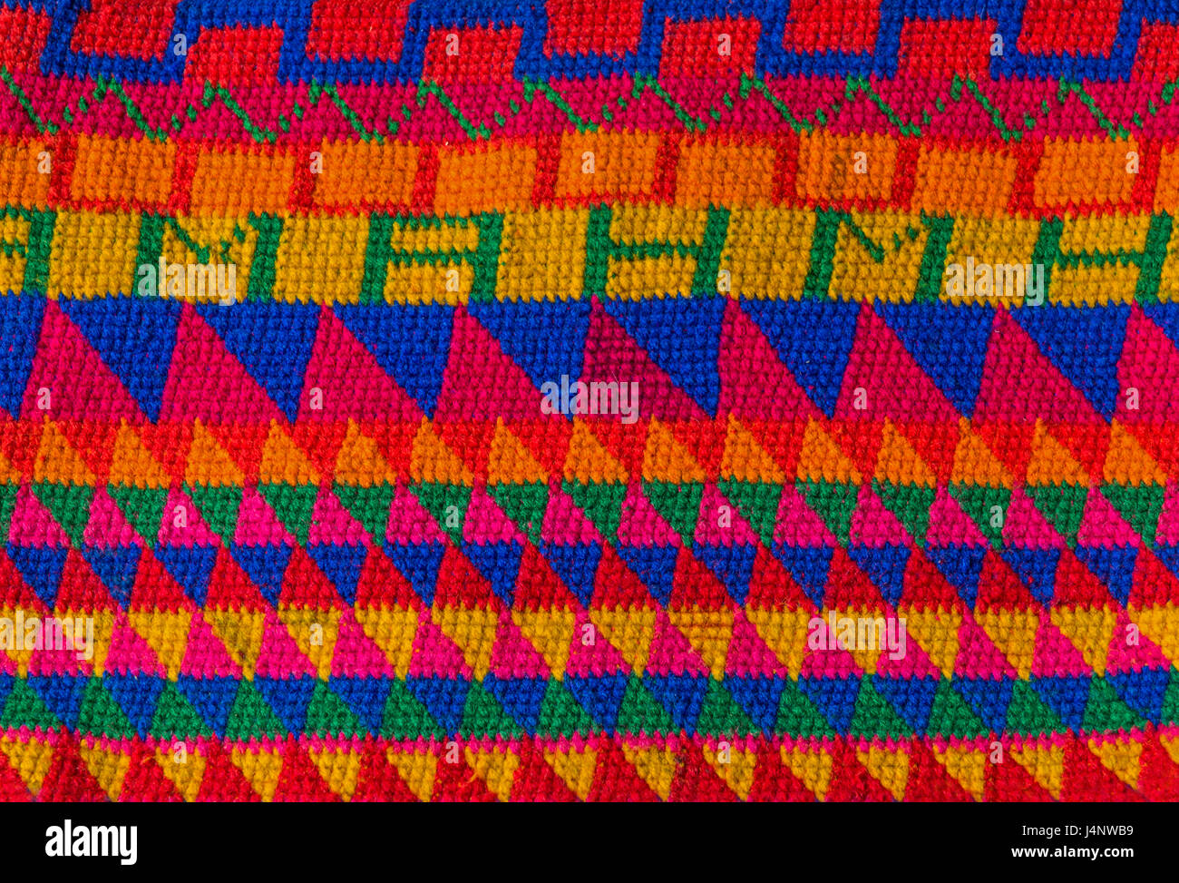 Detail of a colourful indigenous style wool textile in San Cristobal de las Casas, Mexico. Stock Photo