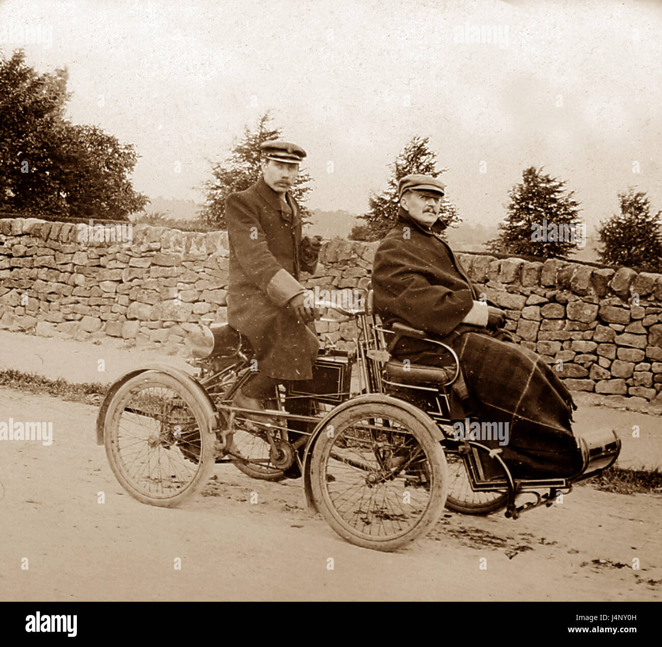 Veteran car with chauffeur, taken in Derbyshire - early 1900s Stock Photo