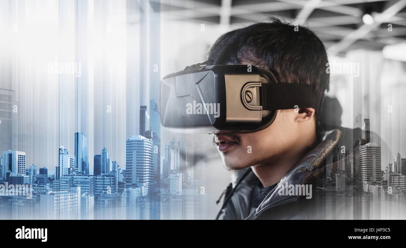 Businessman wearing virtual reality googles, with double exposure ...