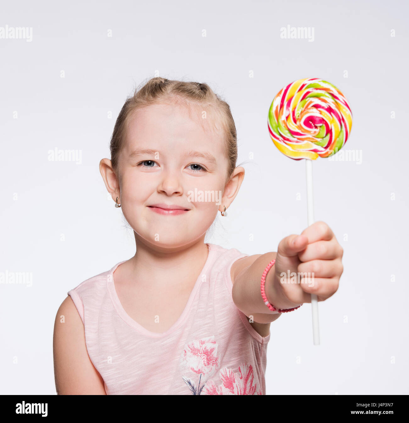 little happy girl with bright caramel Stock Photo