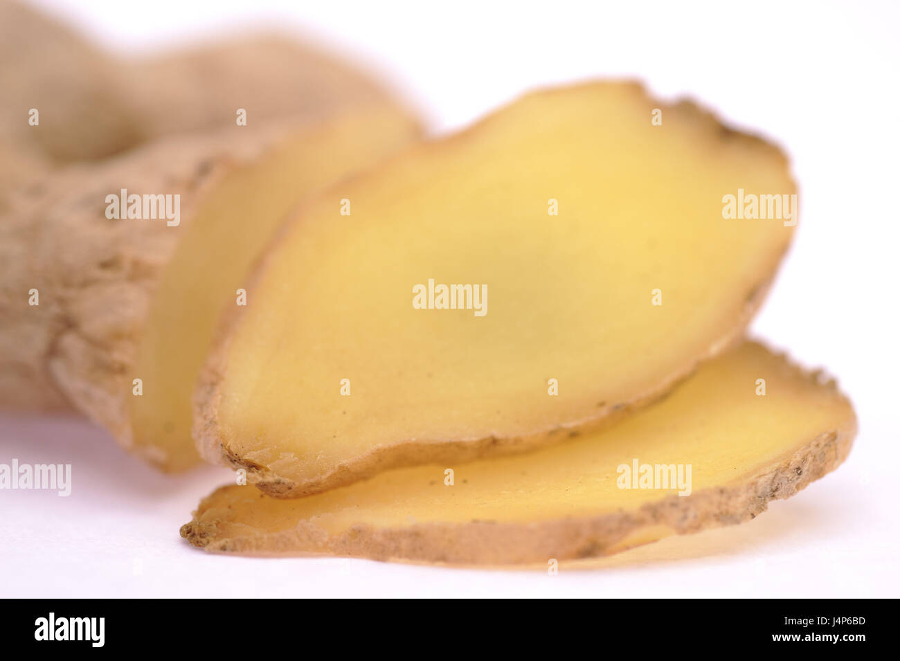 Ginger root, Zingiber officinale, slices, cut open, detail, blur Stock