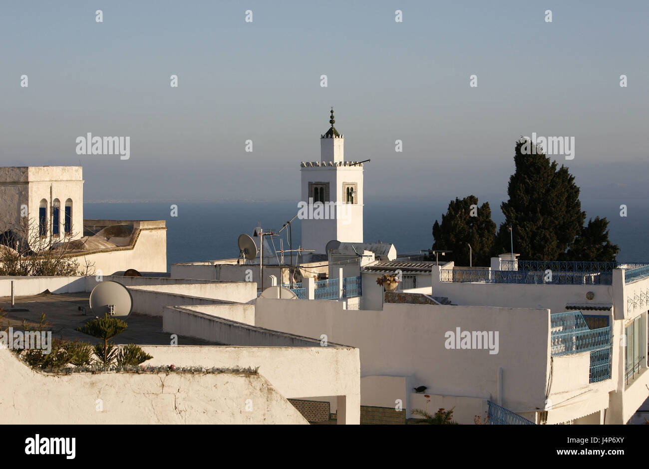 Tunisia, Sidi Bou Said, Old Town, local view, terrace, minaret, sea, evening light, Stock Photo