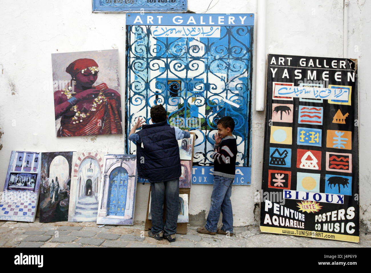 Tunisia, Sidi Bou Said, Old Town, street sales, painting, children, Stock Photo