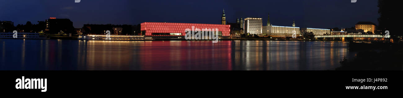 Austria, Upper Austria, Linz, town view, Lentos art museum, lighting, red, evening, town, destination, place of interest, art, culture, museum, architecture, building, museum building, outside, winter, snow, lights, Illumination, radiant, flux Danube, mirroring, water surface, panorama, Stock Photo