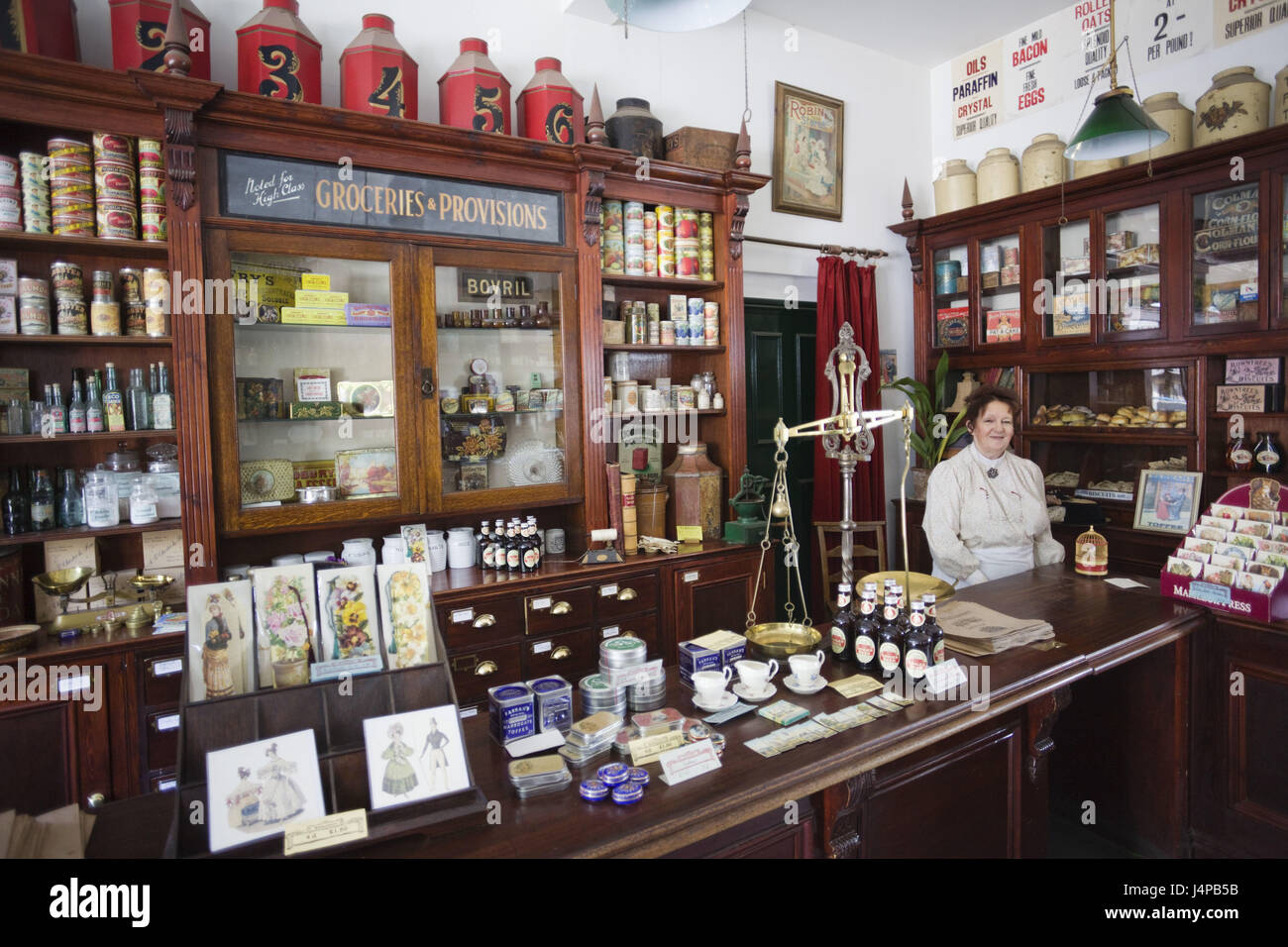 Great Britain, England, Shropshire, Coalport, Blists Hill Victorian Town museum, main business, shop assistant, no model release, Stock Photo