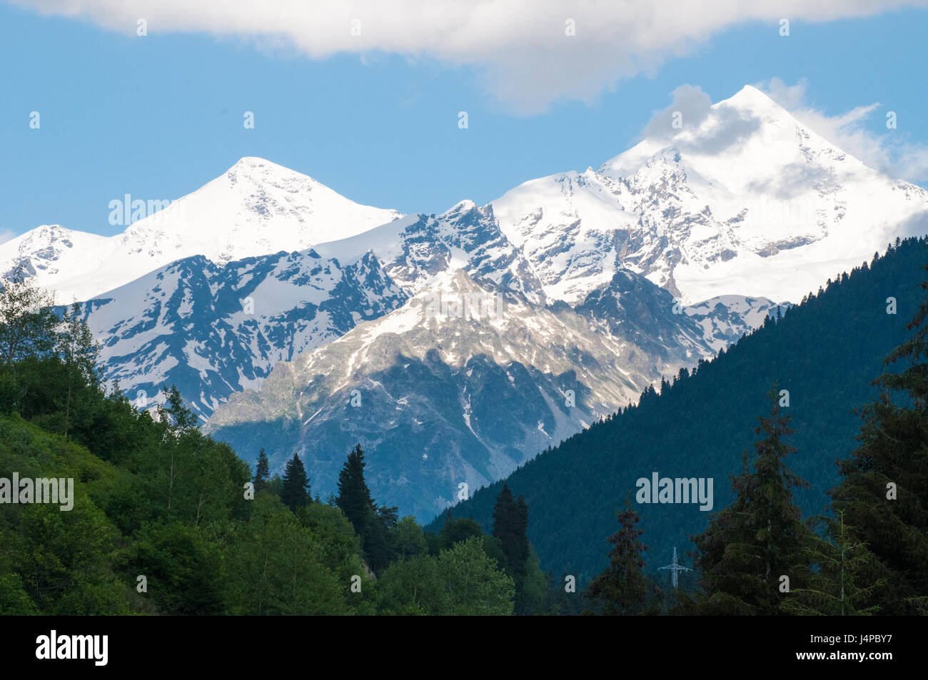 Peaks of the High Caucasus rise above Mestia in the Svaneti region, Republic of Georgia Stock Photo