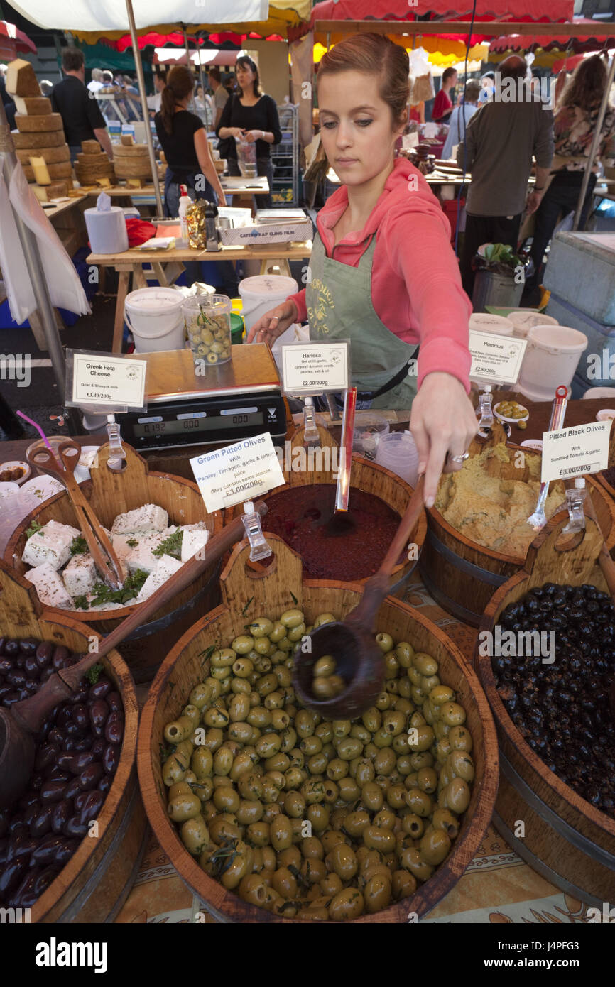 Great Britain, England, London, Southwark, borough Market, olive state, shop assistant, no model release, Stock Photo