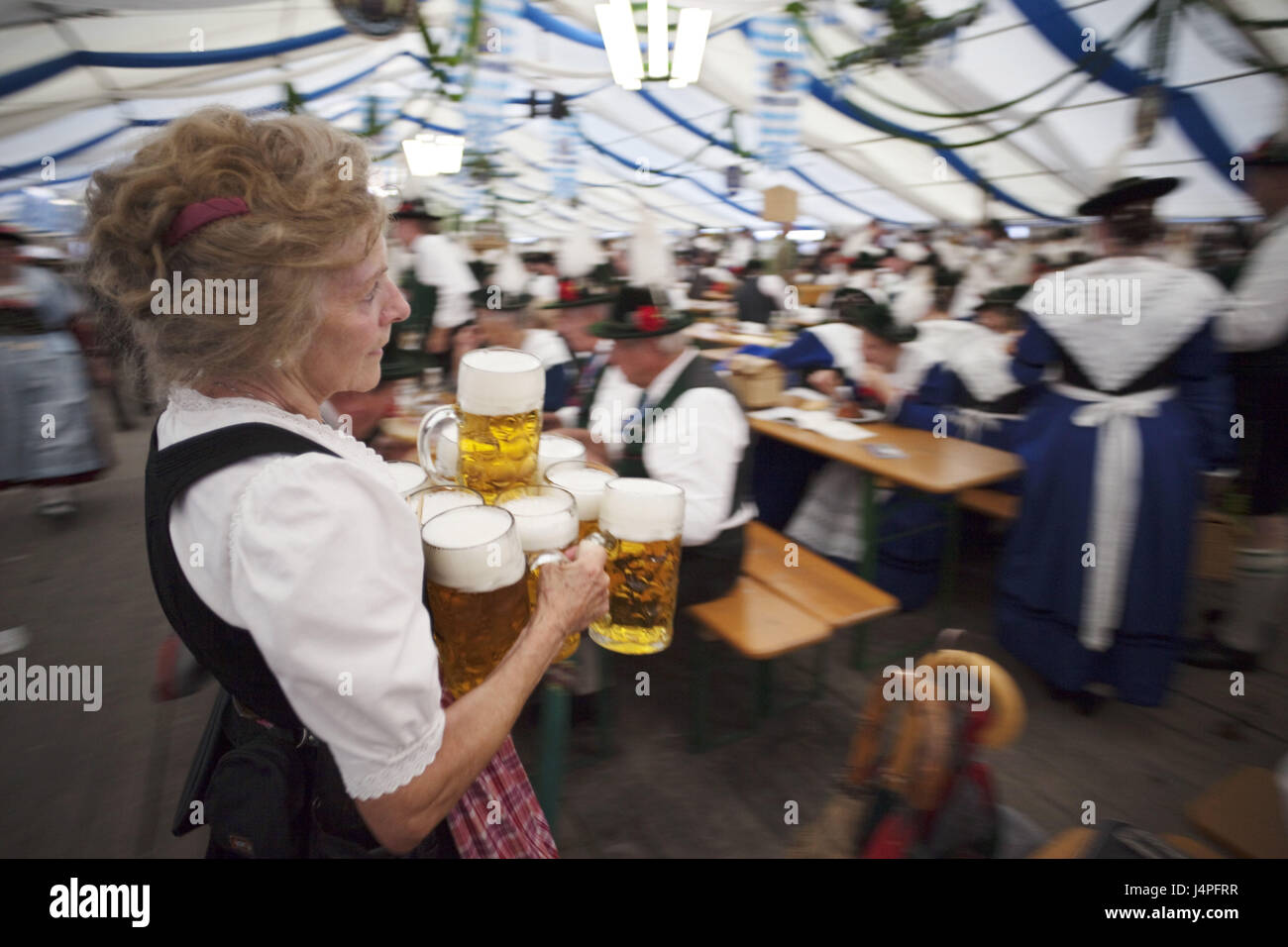 Germany, Bavaria, Munich, October feast, beer tent, service, beer mugs, carry, no model release, Stock Photo