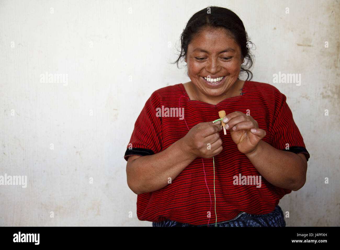Guatemala, San Cristobal Totonicapan, woman, worry doll, production, Stock Photo
