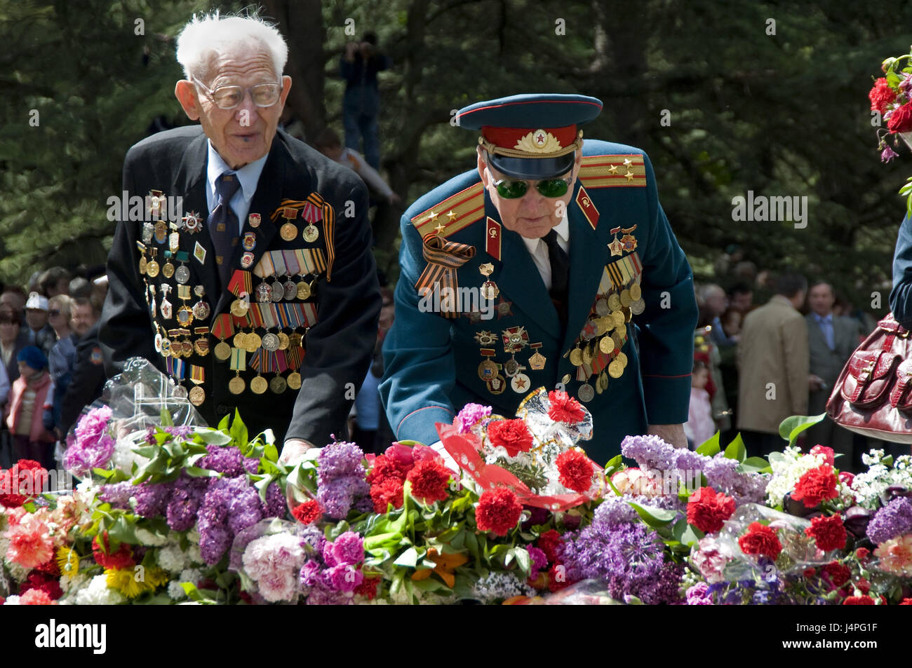 Ex-servicemen with the tag of the victory on the 9th of May in Simferopol, no model release, Stock Photo