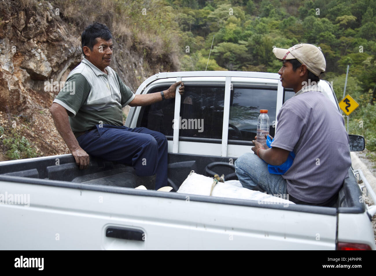 Guatemala, Jacaltenango, man, boy, loading area, pick-up, Stock Photo