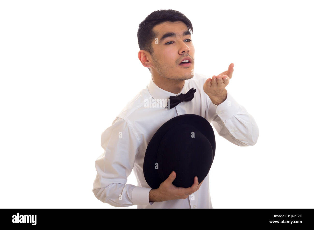 Young man in white T-shirt with black hat Stock Photo