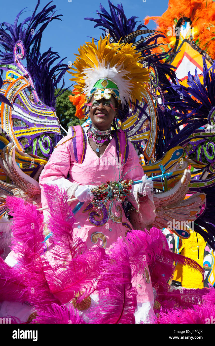 NASSAU, THE BAHAMAS - JANUARY 1 - Female troop leader dances in Junkanoo, a cultural festival in Nassau in Jan 1, 2011 Stock Photo
