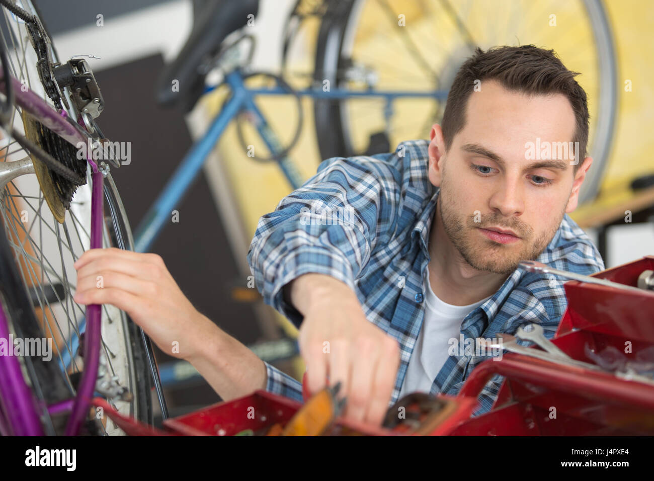 industrial bike assembler Stock Photo Alamy