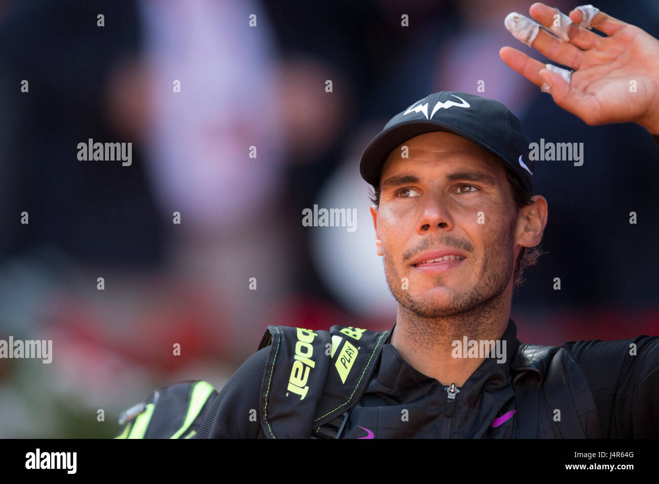 Rafael Nadal of Spain in action against Novak Djokovic of Serbia during a semifinal Madrid Open tennis tournament match at La Caja Magica stadium in Madrid, on Saturday 13, May 2017. Stock Photo
