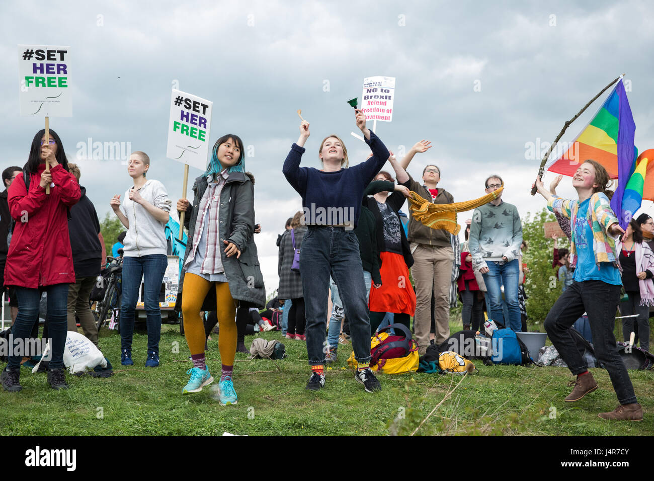 Milton Ernest, UK. 13th May, 2017. Campaigners against immigration detention communicate with detainees inside Yarl's Wood Immigration Removal Centre during a large protest organised by Movement For Justice By Any Means Necessary. Campaigners, including former detainees, called for all immigration detention centres to be closed. Credit: Mark Kerrison/Alamy Live News Stock Photo