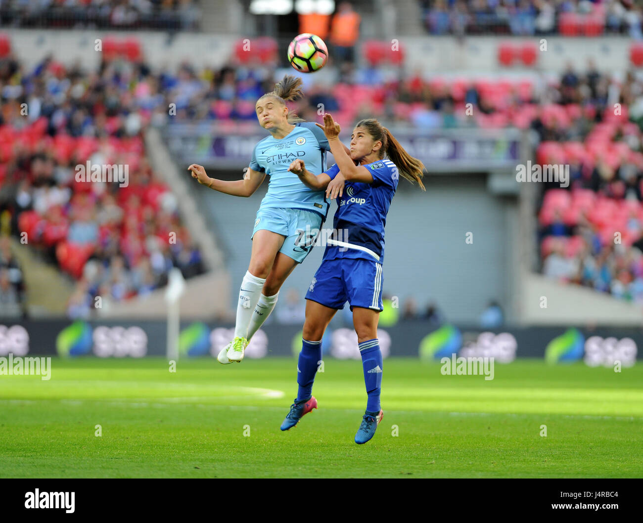 London, UK. May 13th 2017, Wembley Stadium, London, England; The SSE Womens FA Cup Final, Manchester City versus Birmingham City; Georgia Stanway (L) rises to challenge for the ball with Paige Williams (R) at Wembley Stadium. © David Partridge / Alamy Live News Stock Photo
