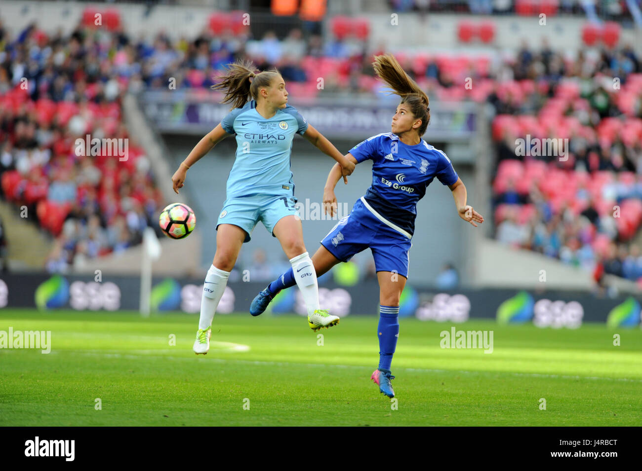 London, UK. May 13th 2017, Wembley Stadium, London, England; The SSE Womens FA Cup Final, Manchester City versus Birmingham City; Georgia Stanway (L) rises to challenge for the ball with Paige Williams (R) at Wembley Stadium. © David Partridge / Alamy Live News Stock Photo