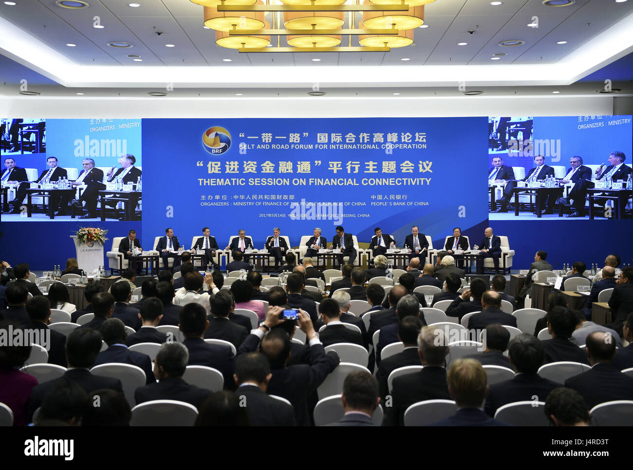 Beijing, China. 14th May, 2017. Thematic Session on Financial Connectivity is held at the China National Convention Center in Beijing, capital of China, May 14, 2017. Six thematic sessions of the Belt and Road Forum (BRF) for International Cooperation were held here on Sunday. Credit: Wu Xiaoling/Xinhua/Alamy Live News Stock Photo