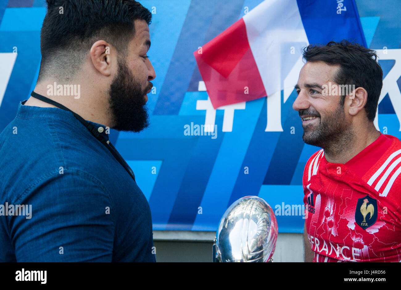Paris, France. 14th May 2017. Rabah Slimani with the Challenge Cup speaks to French Sevens captian, Julien Candelon, as the Stade Francais Paris players parade the trophy around their home ground, Stade Jean Bouin. They beat Gloucester 25 - 17 in Murrayfield, Scotland to clinch the trophy. Credit: Elsie Kibue / Alamy Live News Stock Photo