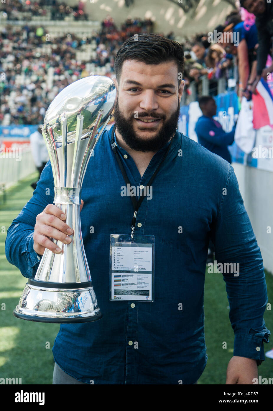 Paris, France. 14th May 2017. Rabah Slimani with the Challenge Cup as the Stade Francais Paris players parade the trophy around their home ground, Stade Jean Bouin. They beat Gloucester 25 - 17 in Murrayfield, Scotland to clinch the trophy. Credit: Elsie Kibue / Alamy Live News Stock Photo
