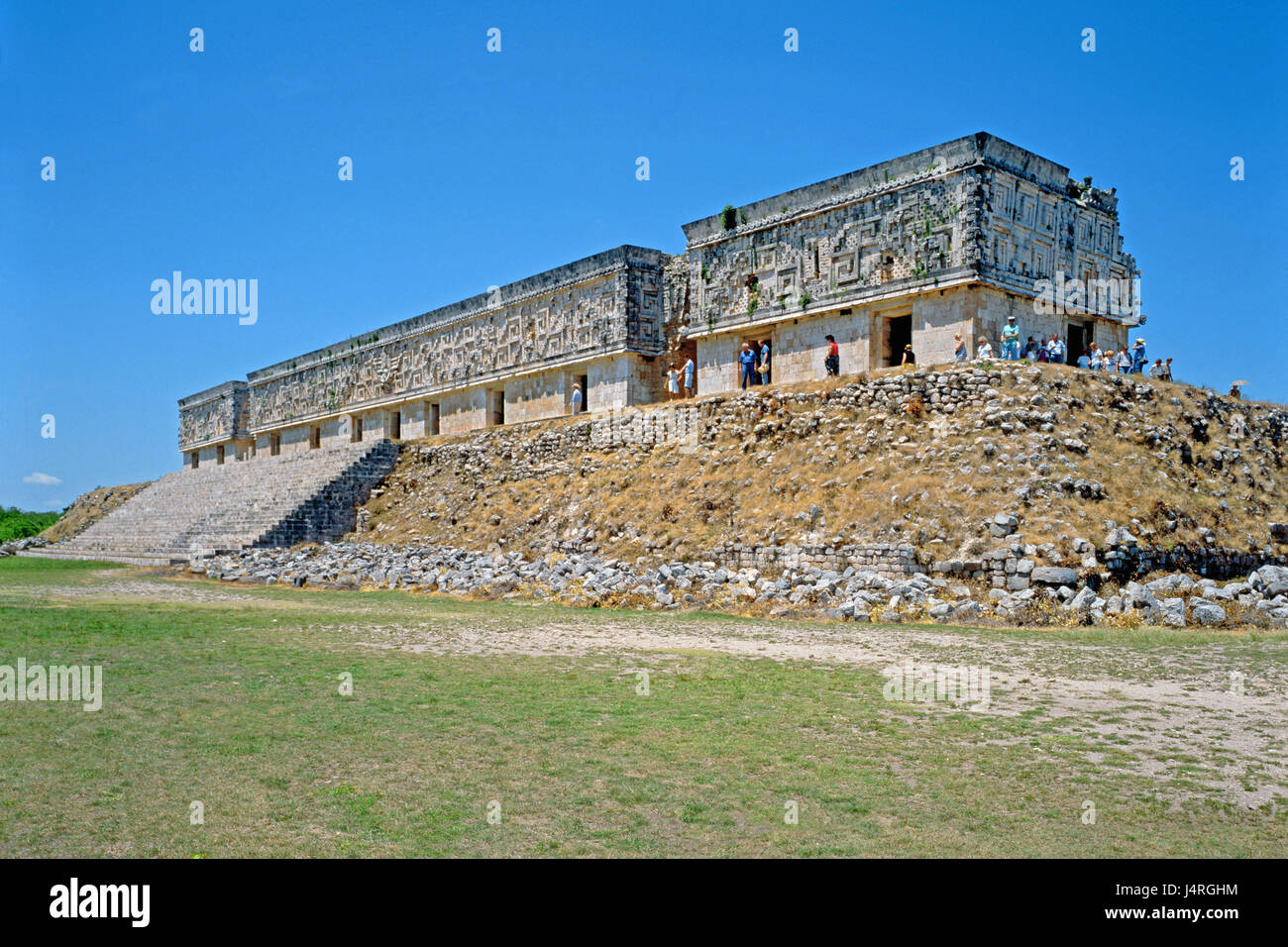 Mexico, Yucatan, Uxmal, governor's palace, tourist, palace, building, outside, people, tour group, tourism, place of interest, sky, blue, Stock Photo