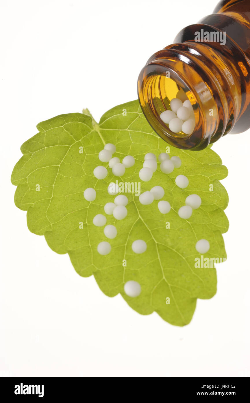 Alternative medicine, homoeopathy, Globuli, leaves, studio, medium close-up, Stock Photo