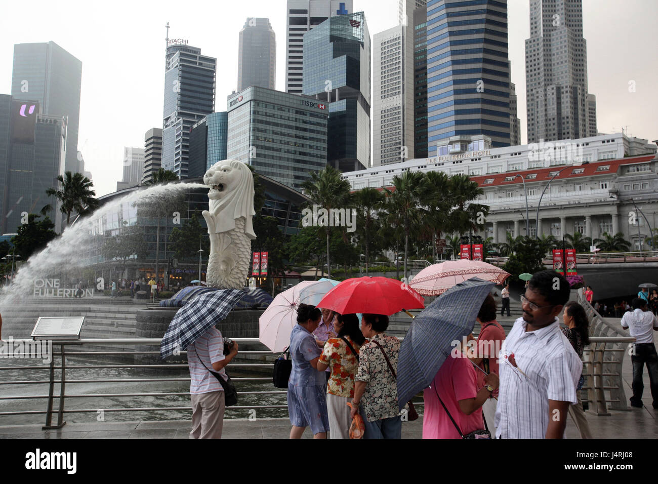 Singapore, island, town, skyline, centre, Merlion, statue, well, landmark, rainy season, rain, tourist, no model release, Stock Photo