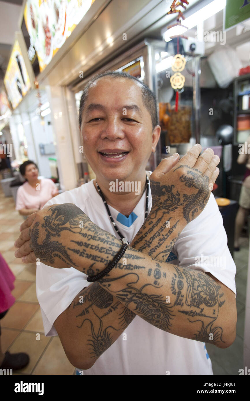 Singapore, Singapore town, Chinatown, man, forearms, tattoos, gesture, half portrait, Stock Photo