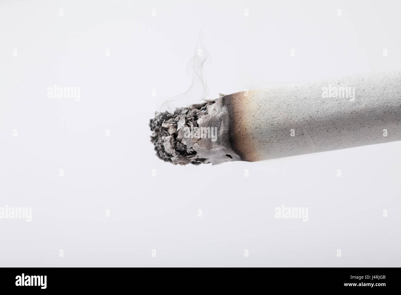 Burning cigarette hires stock photography and images Alamy
