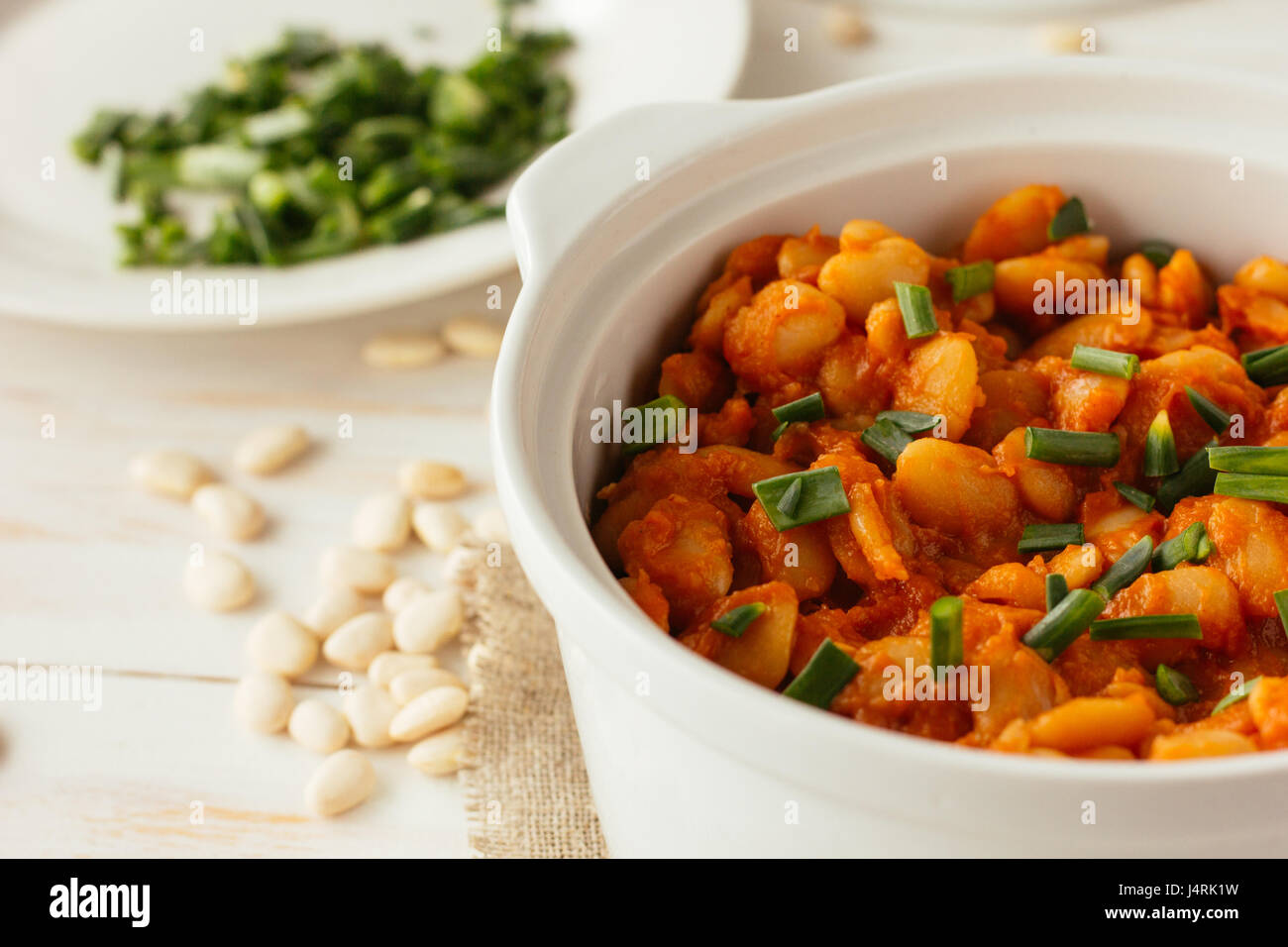 Baked lima beans in white pan selective focus Stock Photo