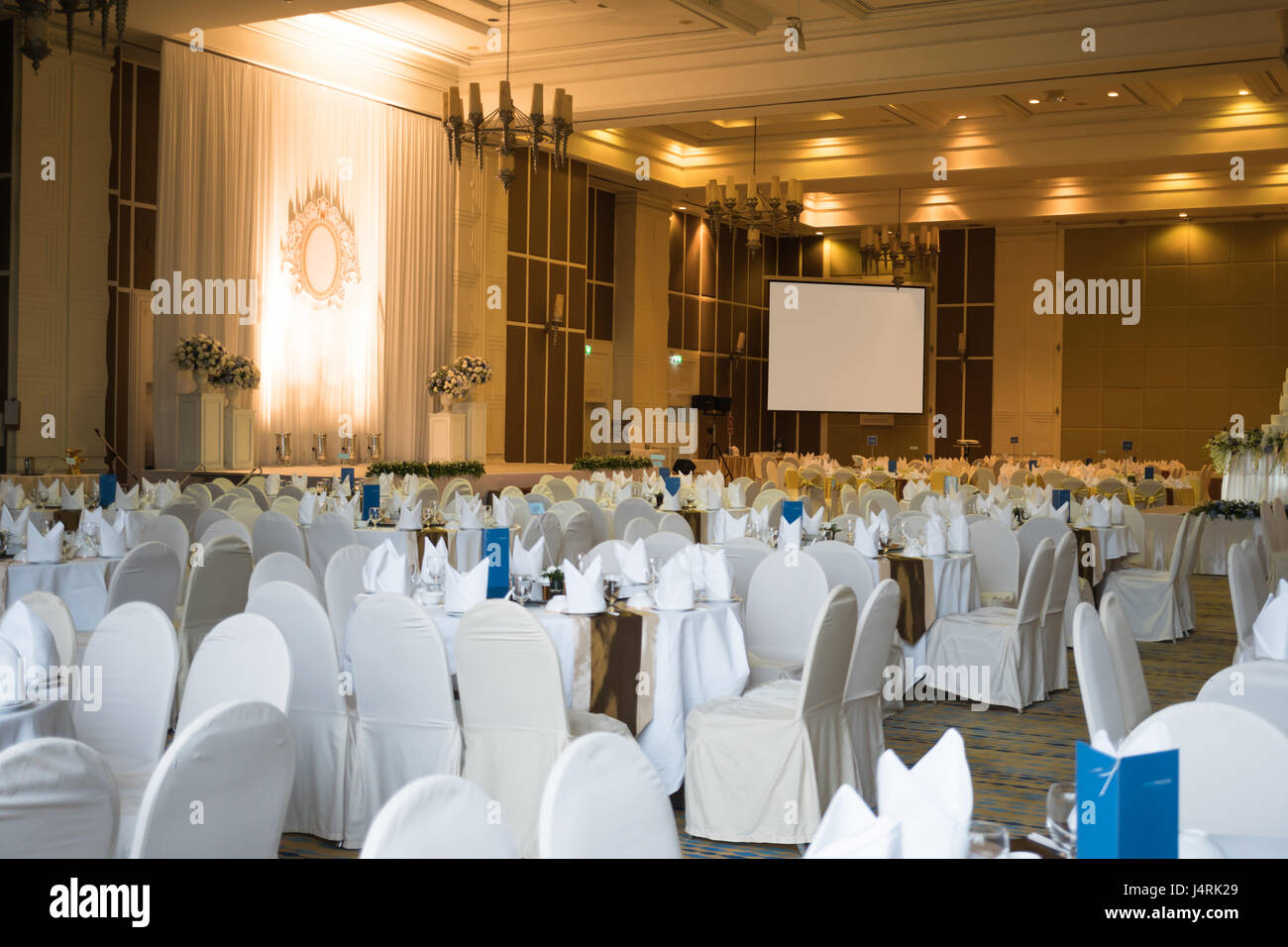 Beautiful ballroom decorated for a wedding reception with clipping path of projector  screen Stock Photo - Alamy