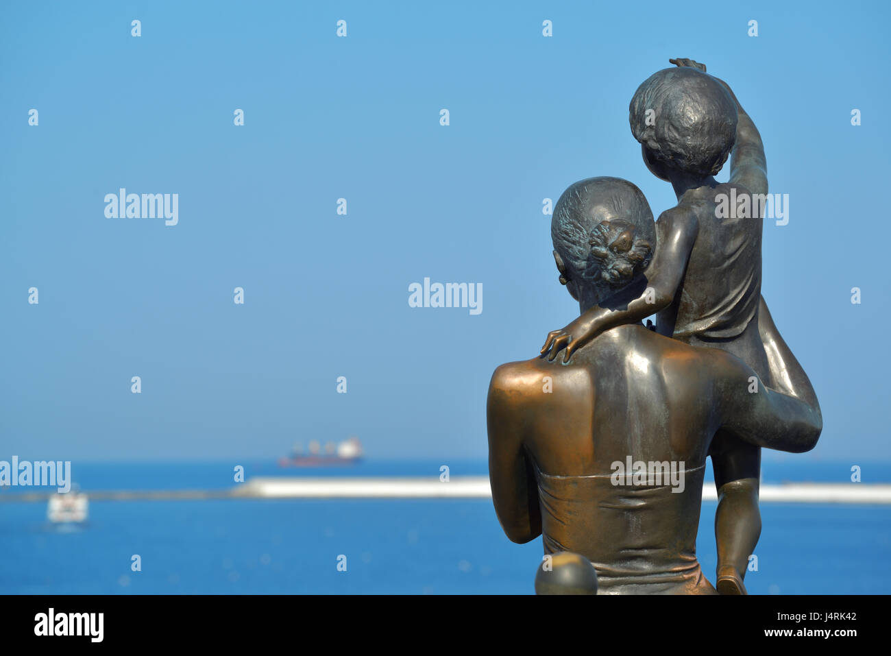 Beautiful view of the open sea with a sculpture to the sailor's wife in the seaport of Odessa. Black Sea. Ukraine Stock Photo