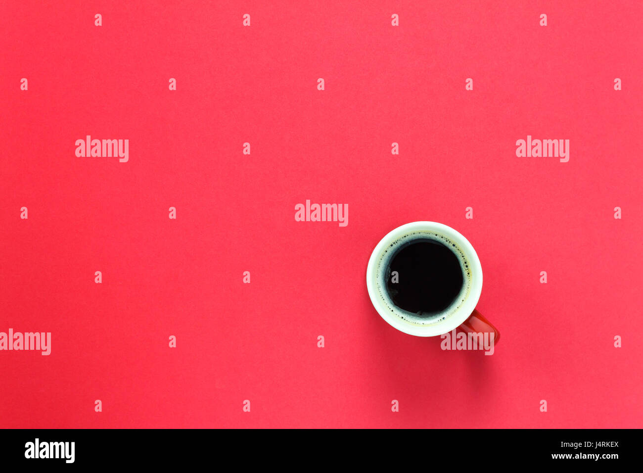 Top view cup of coffee on red background Stock Photo Alamy