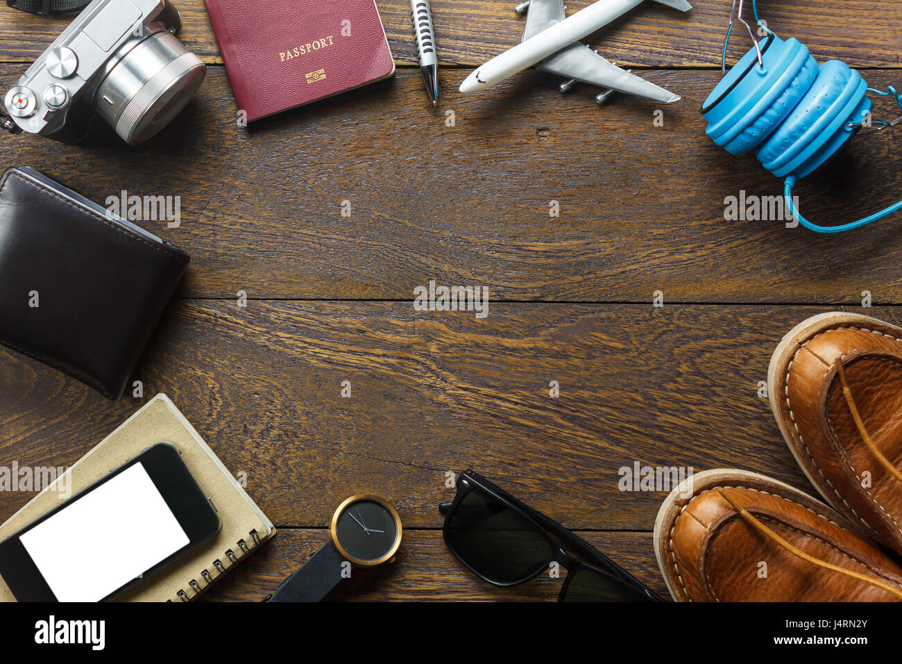 Top view accessories travel with mobile phone,passport,camera,earphones ...