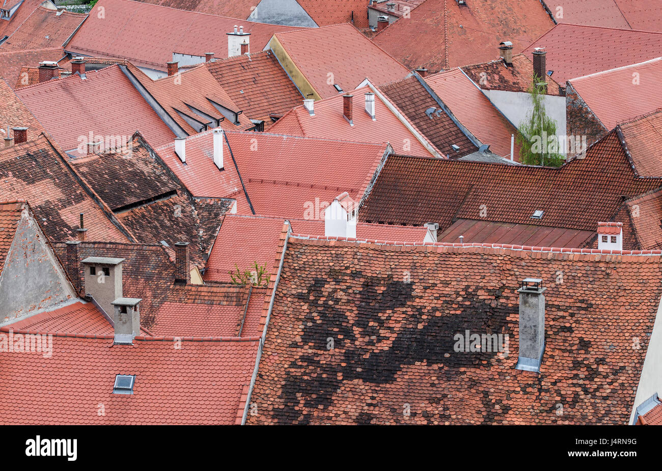 Old small city roofs from above perspective. Stock Photo