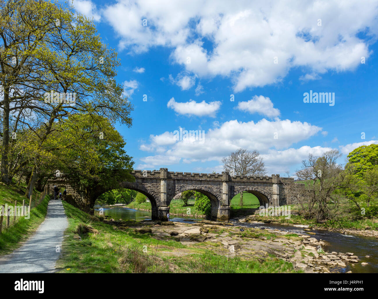 Barden Bridge Aqueduct over the River Wharfe, Strid Wood, near Bolton Abbey, Yorkshire Dales National Park, North Yorkshire, England, UK Stock Photo