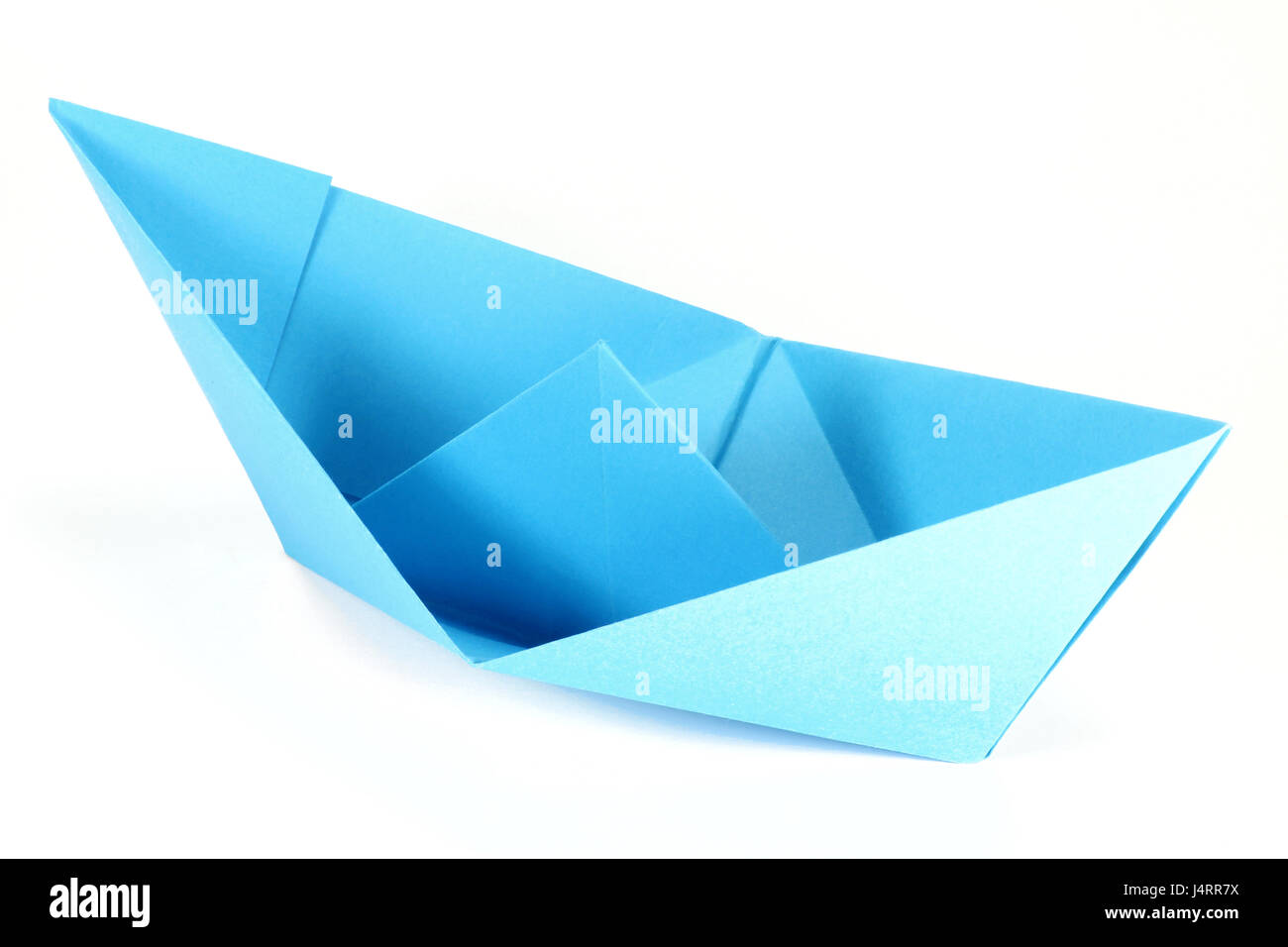 blue paper boat isolated on white background Stock Photo