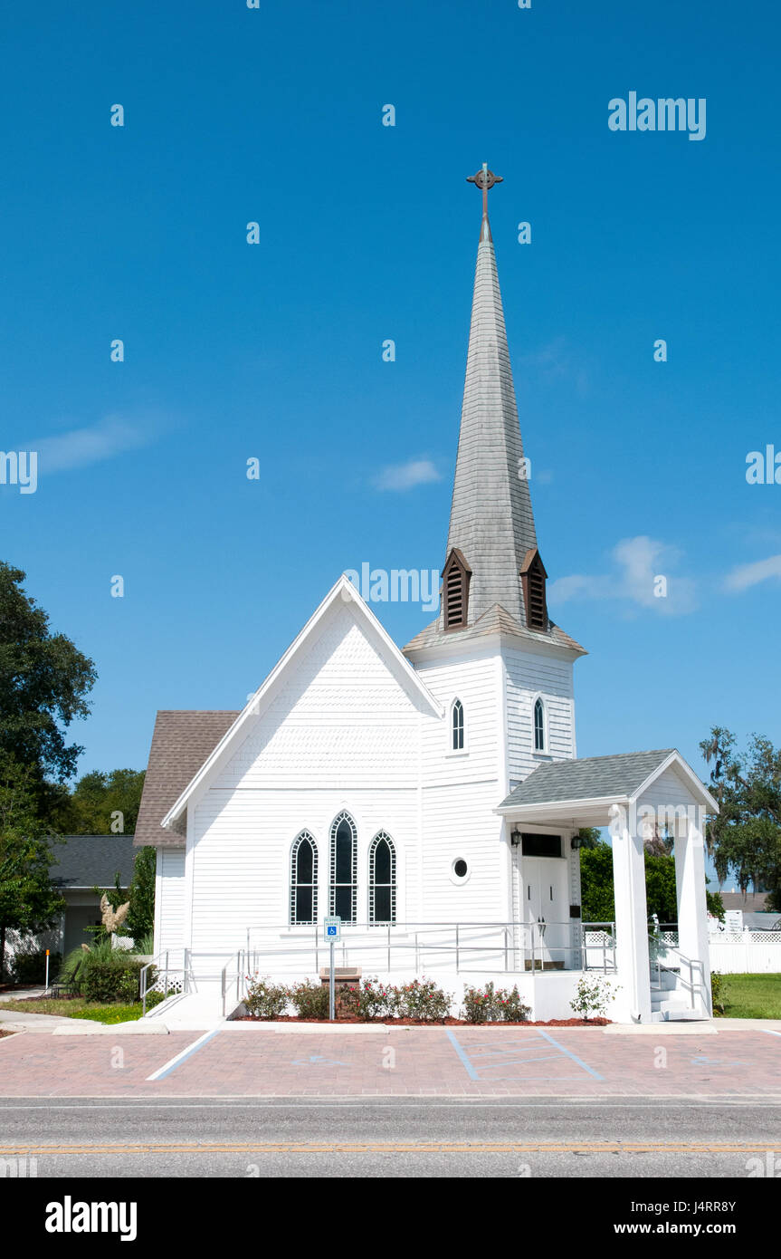 Very small rural christian church with a steeple Stock Photo - Alamy