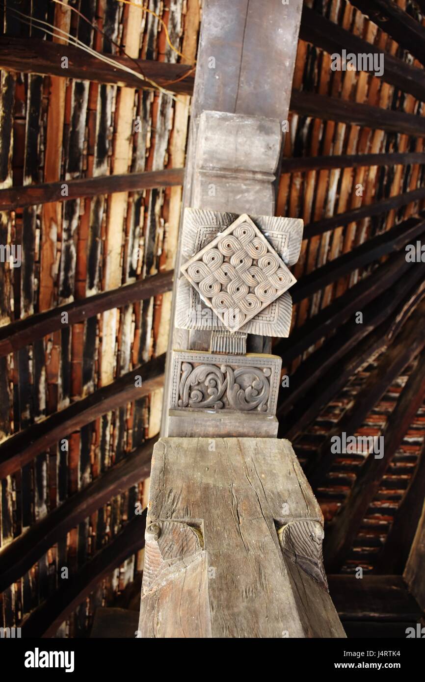 Traditional Motifs carved on Wooden Pillars at the Embekke Devalaya in Embekke, Kandy. Stock Photo