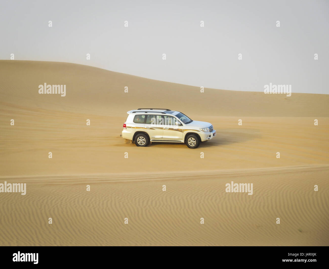 desert safari, dune bashing in a 4 wheel drive Stock Photo