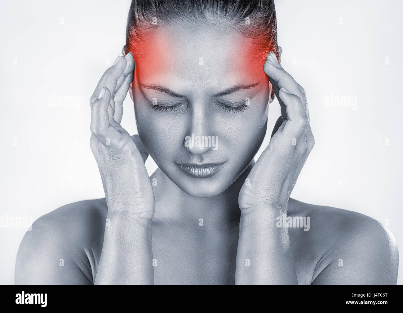 Woman with headache isolated on white background Stock Photo