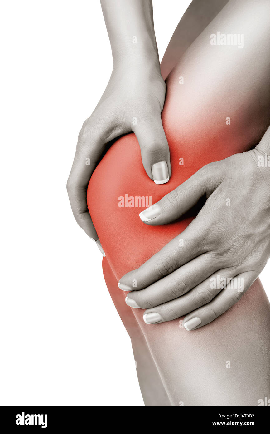 Woman having knee pain isolated on a white background Stock Photo