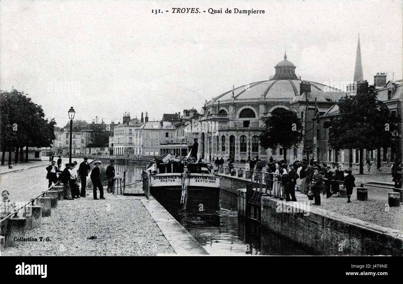 This title refers to the 'cirque' (circus) on Quai Dampierre in Troyes, France. The circus, a historical site, could refer to a location for performances or a cultural space in the city's history. Stock Photo