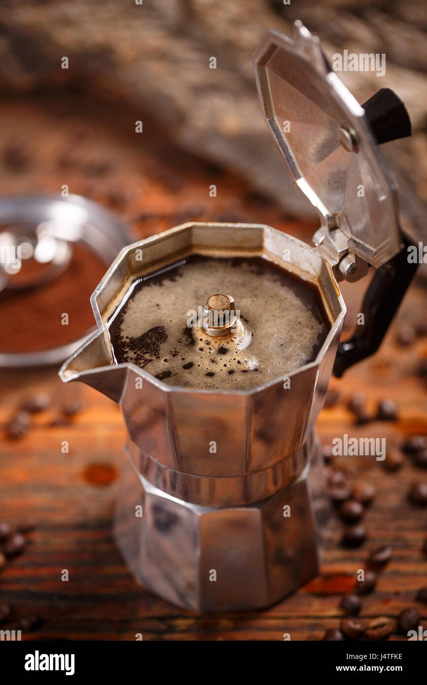 Old espresso pot on vintage wooden background Stock Photo Alamy