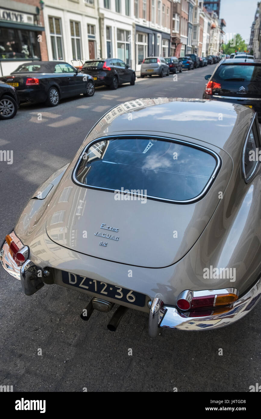 Classic E Type Jaguar car parked on a street, The Hague (Den Haag), The Netherlands. Stock Photo