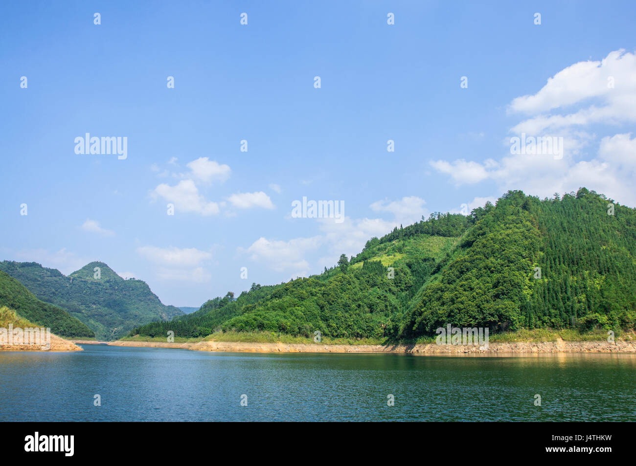 The reservoir scenery with blue sky in summer Stock Photo