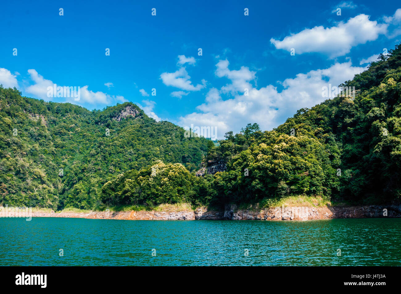 Beautiful reservoir scenery with blue sky in summer Stock Photo
