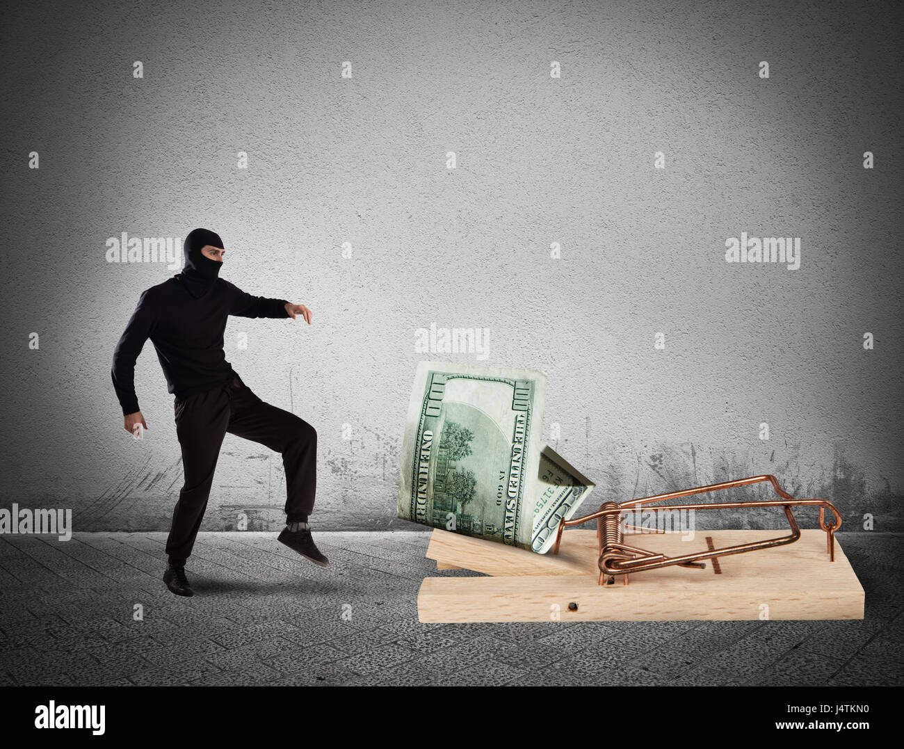 Thief money trap Stock Photo